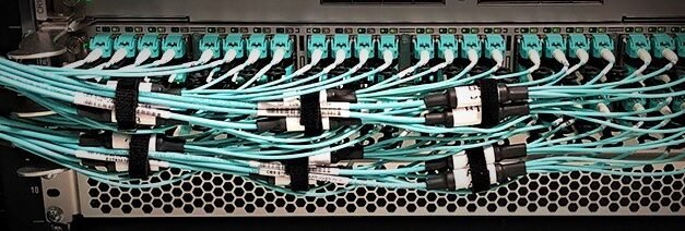 What is the importance of cable management systems in industrial applications?