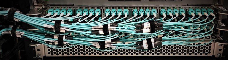 What is the importance of cable management systems in industrial applications?