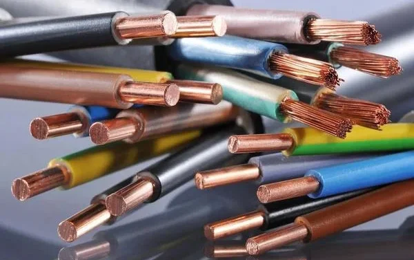 How does insulation material impact the performance of electrical cables and wires?