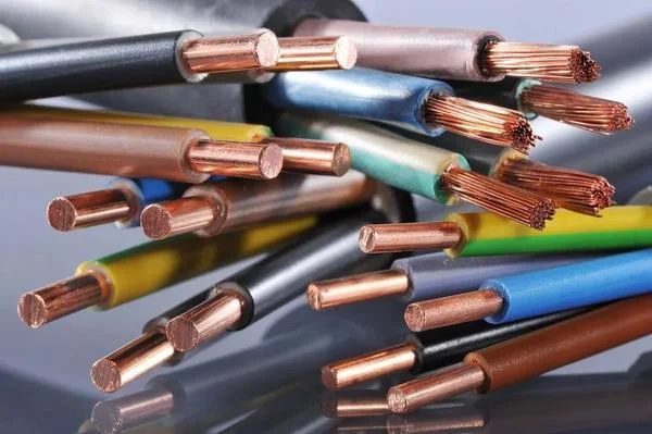 How does insulation material impact the performance of electrical cables and wires?